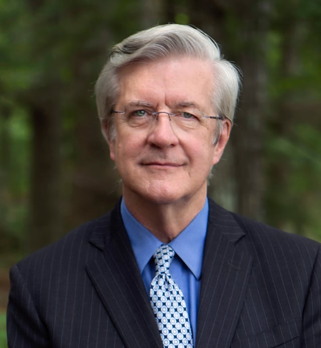 James W. Hughes